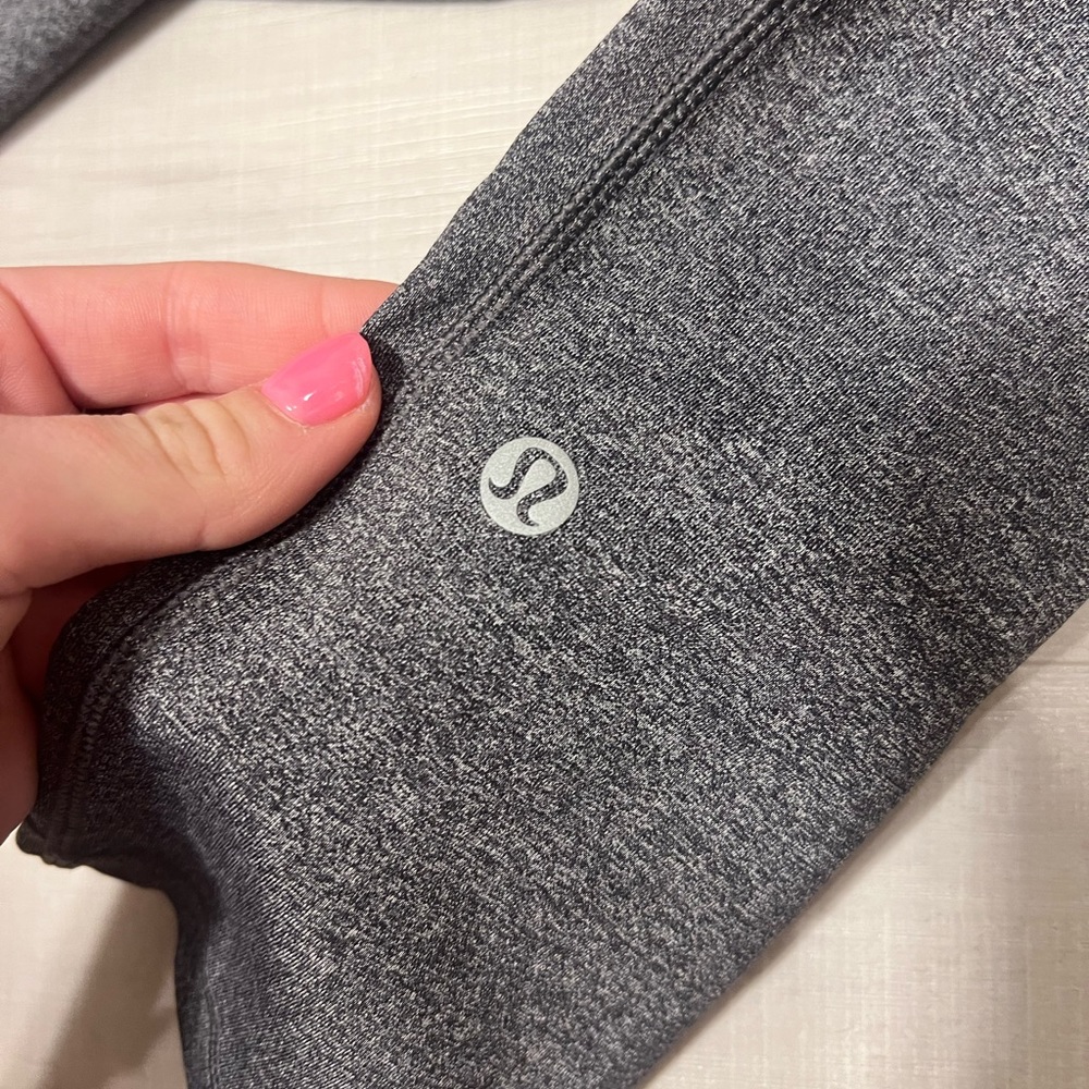 super comfortable grey lululemon leggings. worn once.  pockets for phone etc…